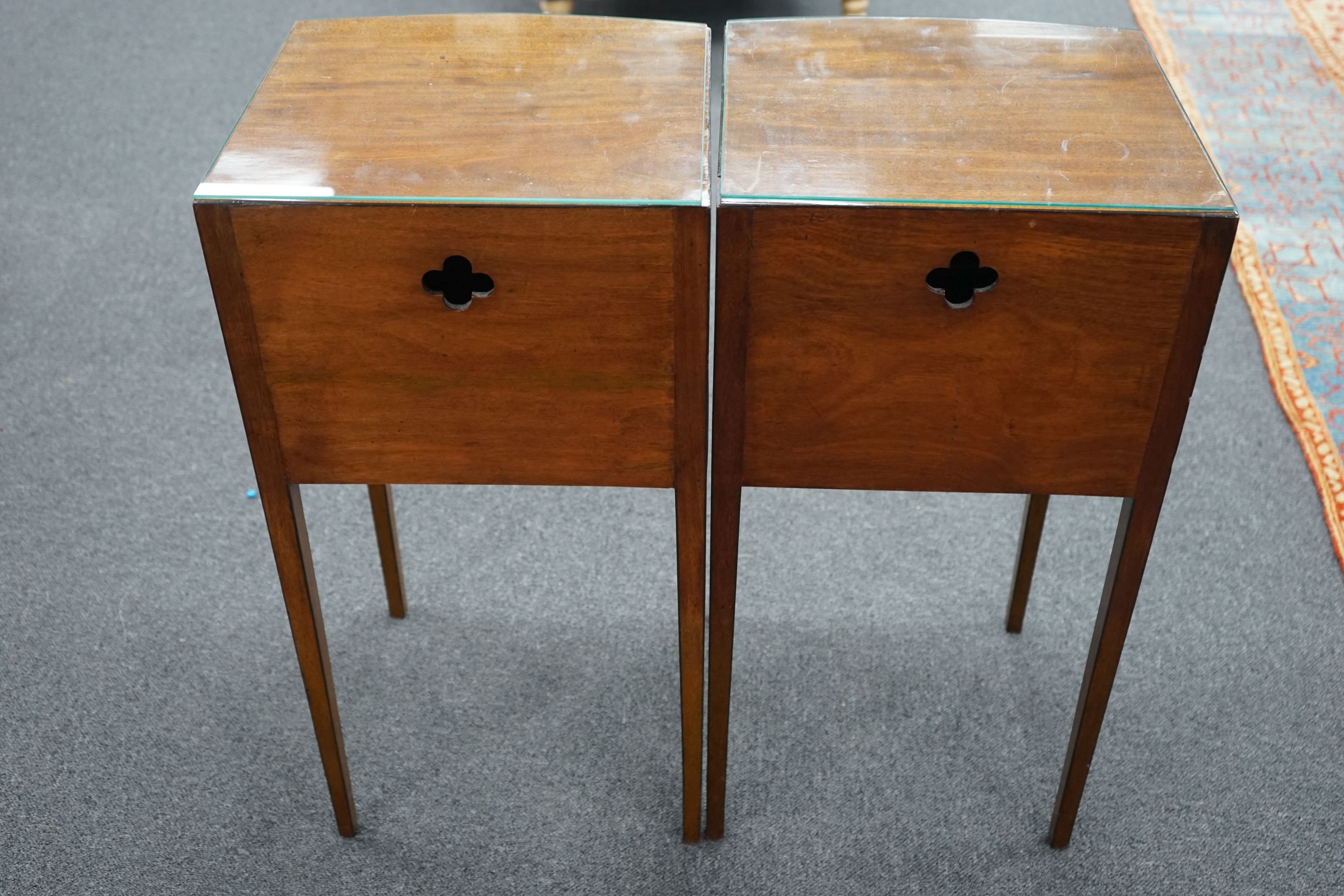 A pair of George III style mahogany bow front bedside cabinets, width 38cm, depth 36cm, height 76cm